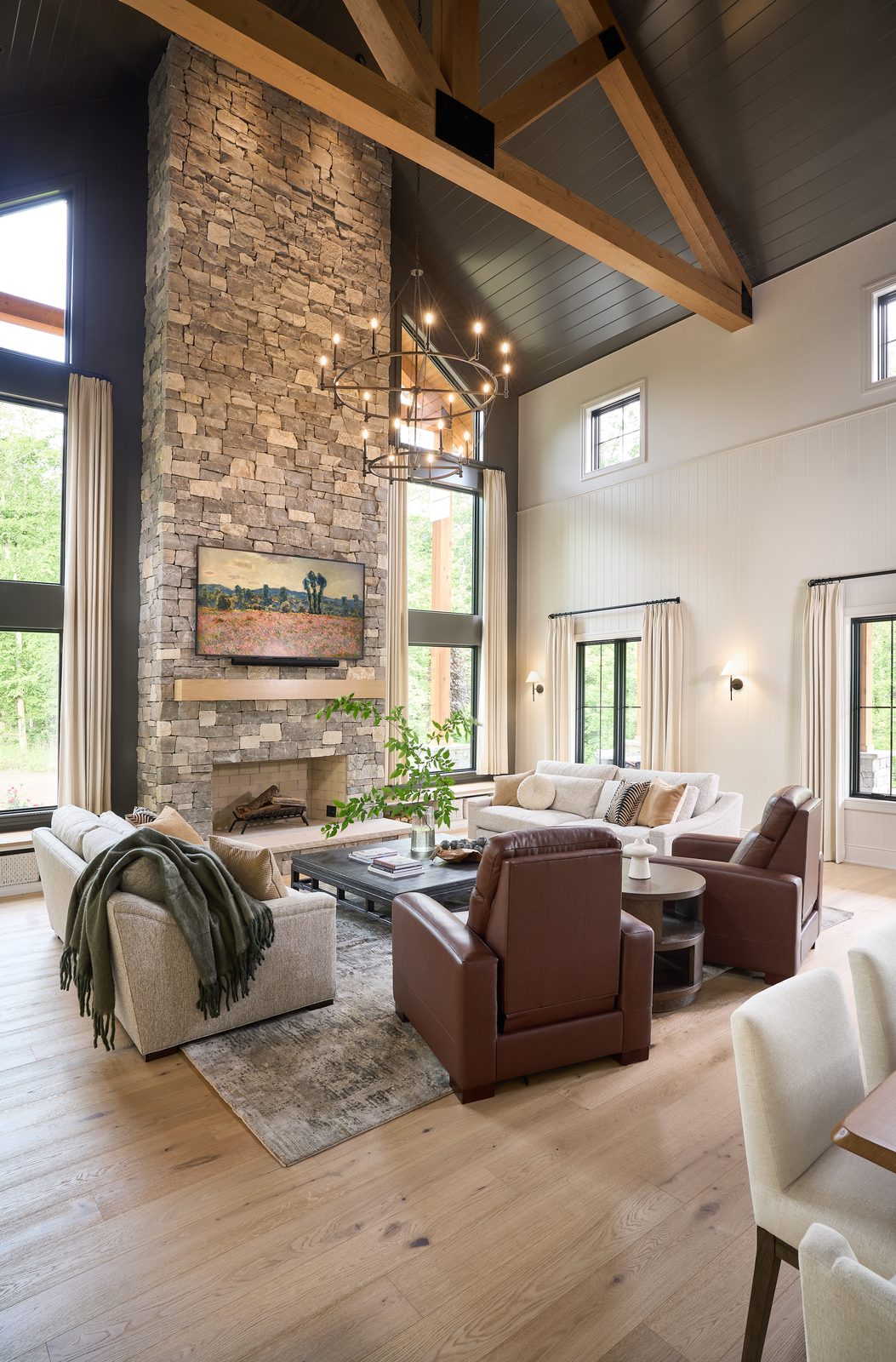 Beach Blend Ashlar limestone chimney rising to a vaulted great room ceiling